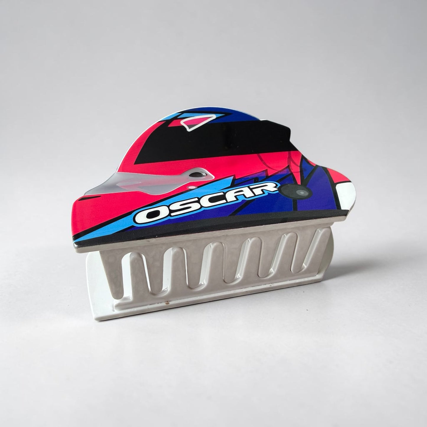 PRE ORDER - Oscar Piastri Pink Helmet Hair Claw